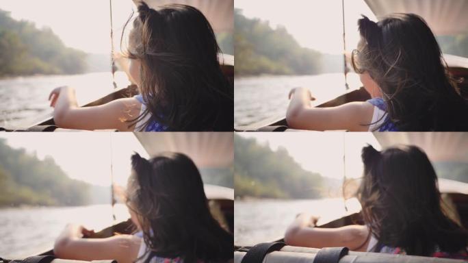 快乐的女孩在船上玩得开心
