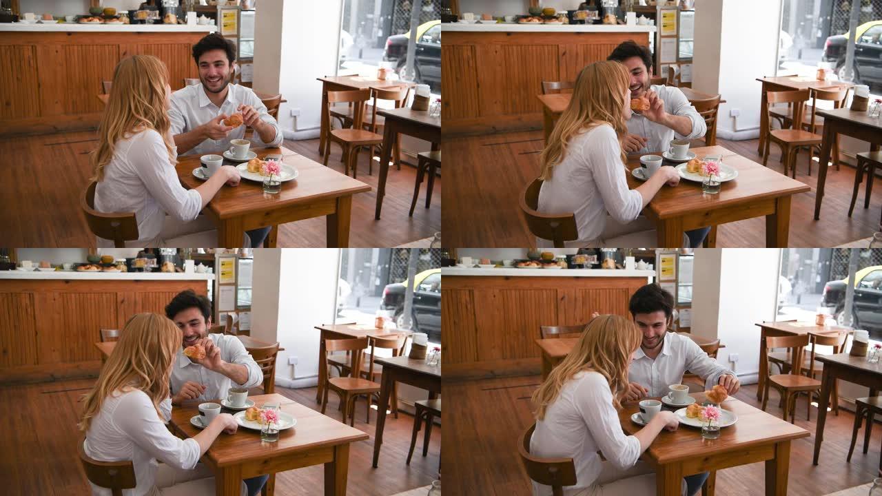 Couple having fu,in布宜诺斯艾利斯咖啡馆