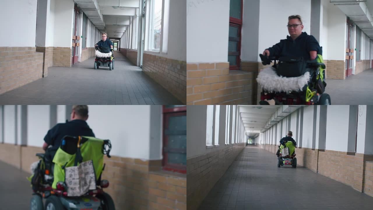 一名坐在轮椅上的男子正沿着一条长长的走廊行驶。