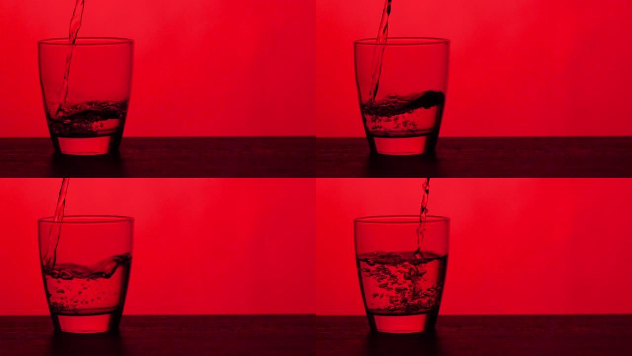 倒水玻璃-红色背景，慢动作