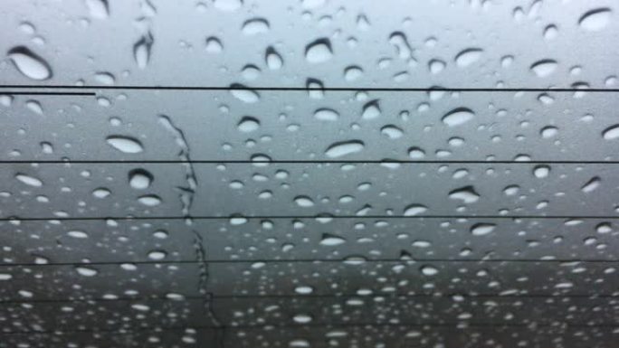 雨水落在窗户上沾水视觉创意视频素材