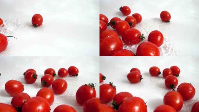洗樱桃番茄。慢动作。