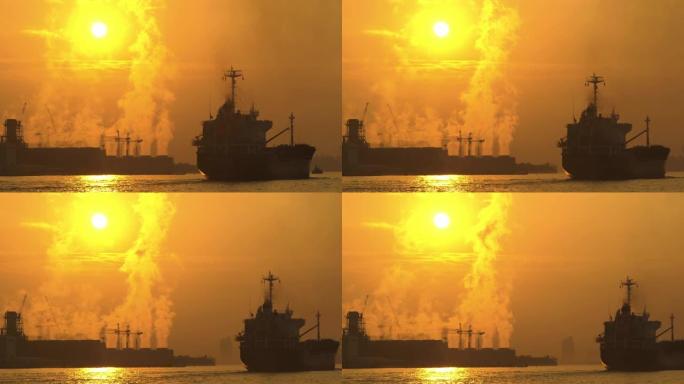 发电站背景日出时的货船