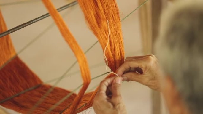 手工织布机上的丝绸棉工业，泰国，选择性聚焦，复古颜色
