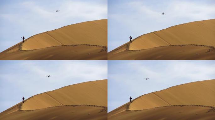 沙丘上的六架直升机