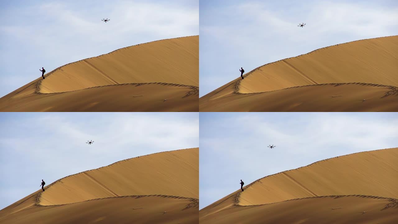 沙丘上的六架直升机