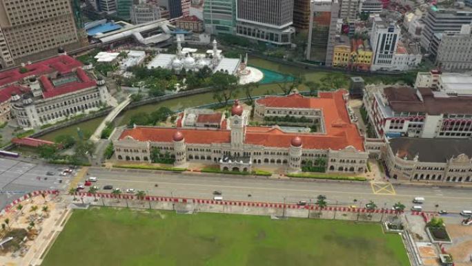 飞越吉隆坡城市宫殿交通河畔阳光明媚的空中俯拍全景4k马来西亚