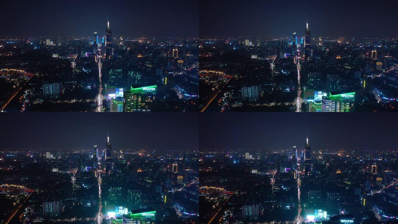 南京市夜间湖滨壁公园市中心塔楼交通街空中全景4k中国