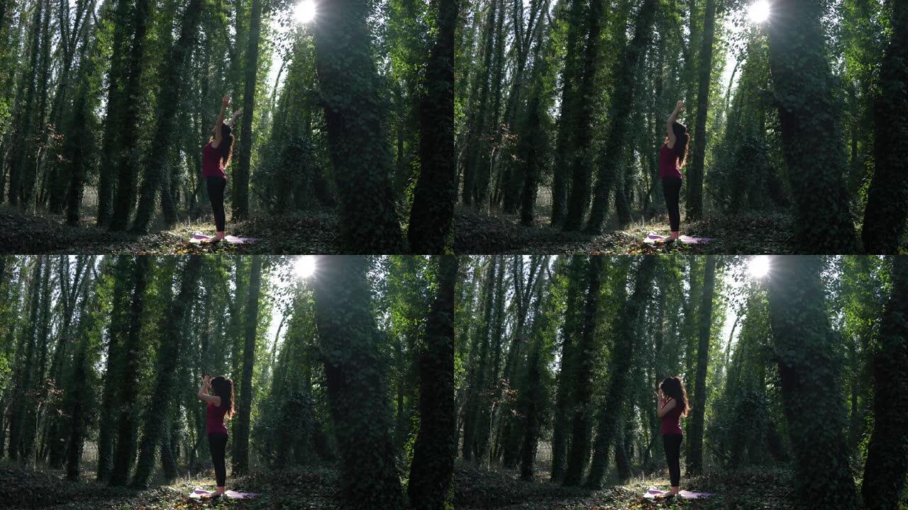 成年女性在丛林中做瑜伽练习的4k视频