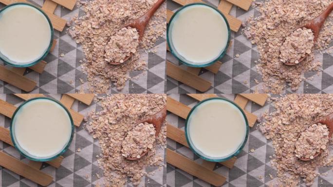 早餐桌上的燕麦和牛奶的俯视图