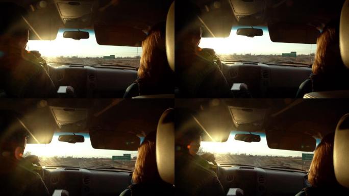 手持慢动作拍摄 “大章克申地区机场” 31号出口标志沿科罗拉多州I-70州际公路从行驶中的车辆后座