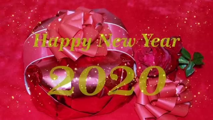 新年快乐2020。雪动画背景上金色闪光的装饰品
