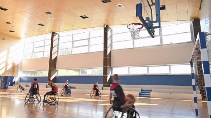 轮椅篮球运动员在健身房进行射击训练