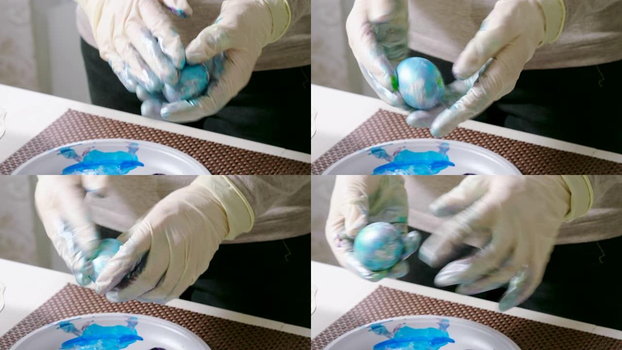 女人画复活节鸡蛋的特写镜头。4K