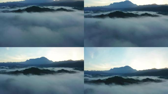 4K航拍画面，令人惊叹的美丽的自然景观景观乡村农场在日出时有雾和薄雾。