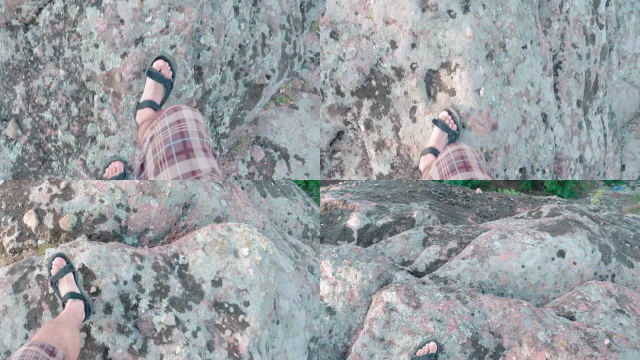 回归自然。视点。单人旅行者在美丽的全景前，从高处俯瞰美丽的红色岩层。自然界中的Vlogging。在阳