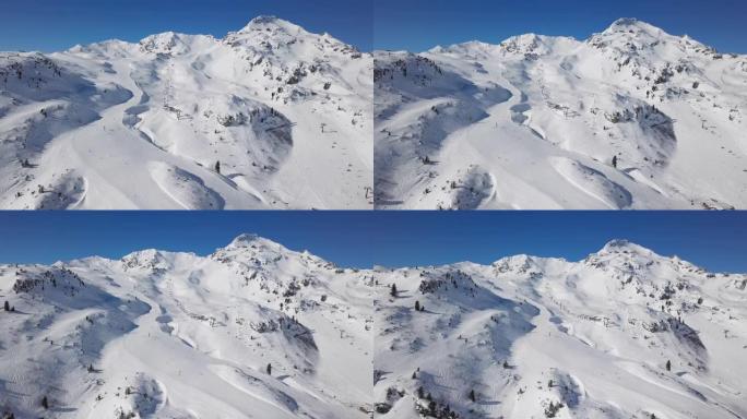 奥地利萨尔茨堡地Obertauern滑雪胜地滑雪场上滑雪者的鸟瞰图。