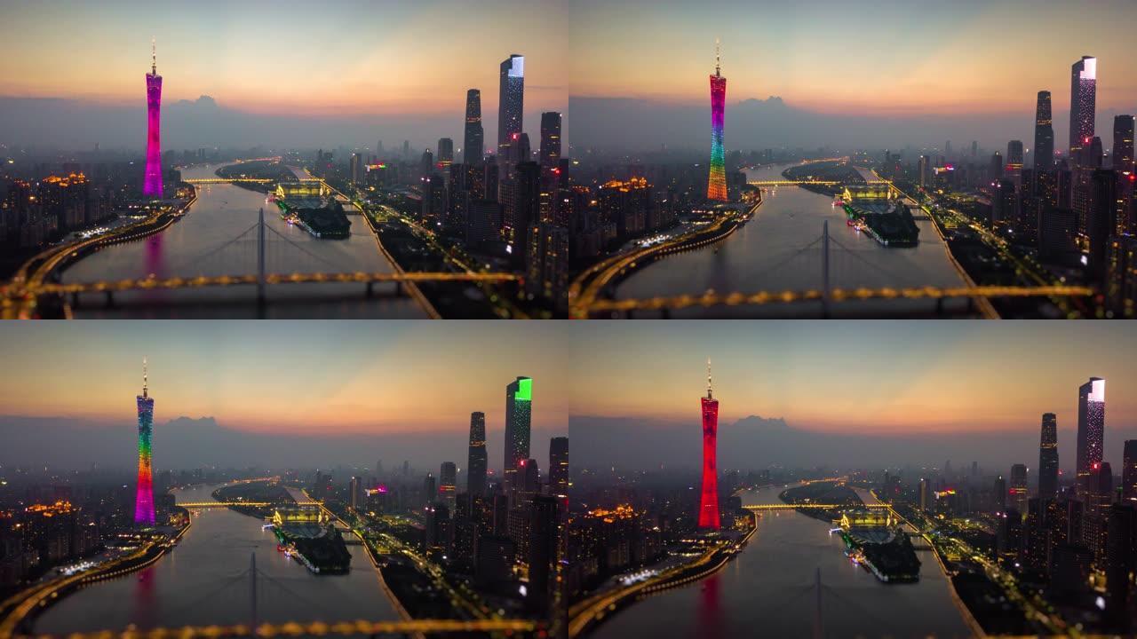 日落时间夜间照明广州市中心城市景观珠江猎德桥空中倾斜移动全景4k延时中国