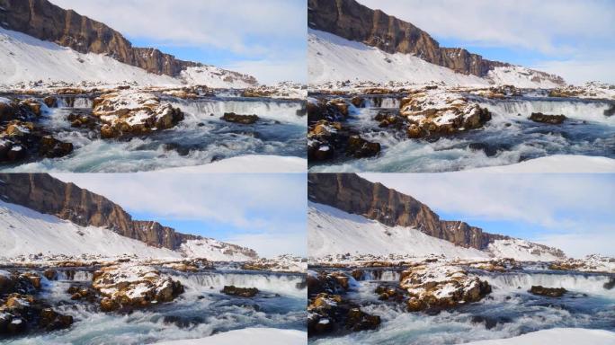 冰冻的河水有瀑布，冬季雪山景观。