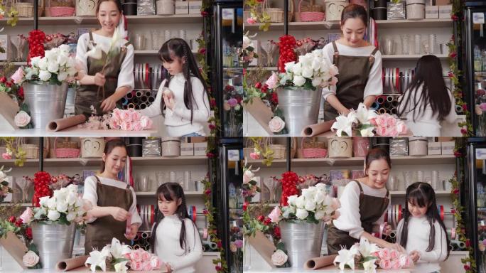 母亲和女儿在花店工作。小女孩帮助她的母亲在商店准备鲜花。团队合作和创业理念。