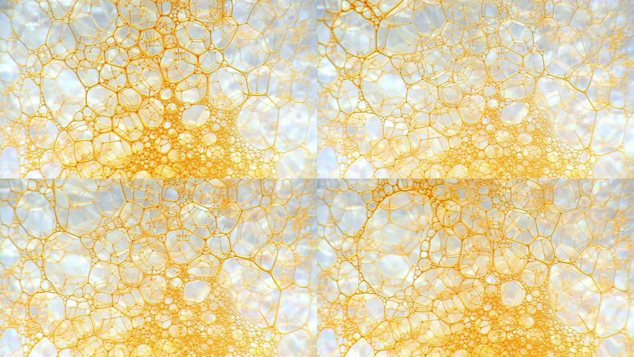 彩色肥皂泡沫与爆裂气泡背景。摘要生物结构，大分子模式。橙色墨水填充了一团在液体中形成的白色小气泡。自