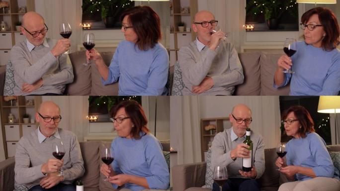 快乐的高级夫妇，喝杯红酒