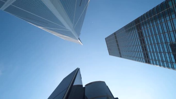 仰望高楼摩天大楼未来派建筑香港城市与蓝天