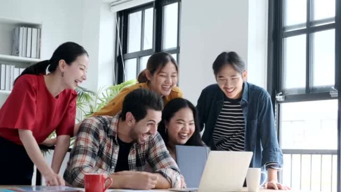 4k uhd掌上亚洲年轻创意快乐人休闲装企业家在非正式脑风暴商务会议上