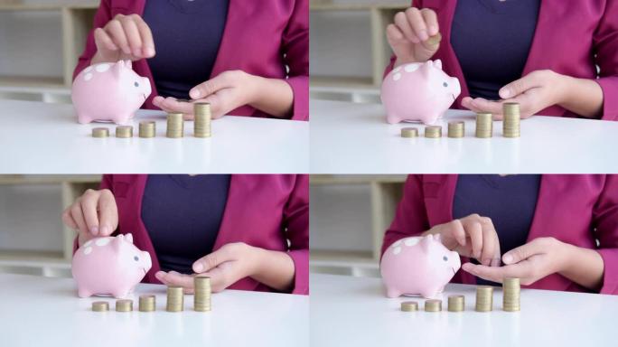 女人将硬币放入带有硬币堆的存钱罐中，以节省资金，计划未来