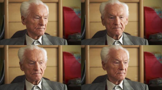 老人退休的肖像。老年男性