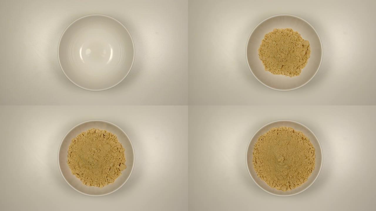 俯视图: 姜粉装满白色碗-停止运动