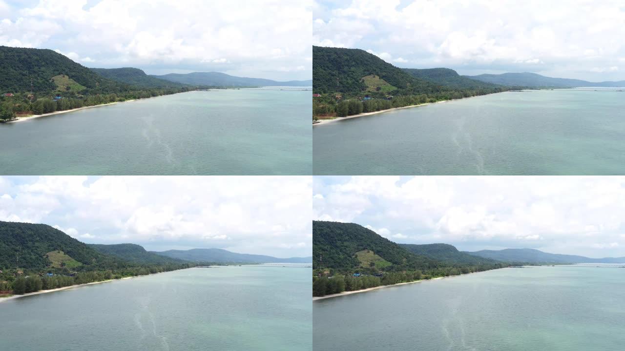 鸟瞰图，沿着峡湾的美丽景观飞行，从水面升起的高山丘陵，海景，日出-黎明，自然之美，旅行目的地，冒险，