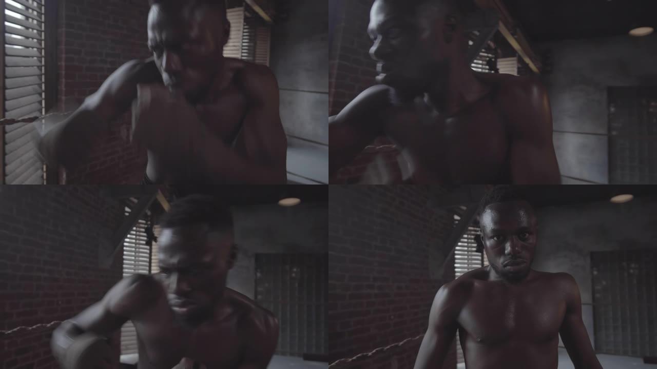 黑人拳击手在拳击场上独自练习拳打和勾拳