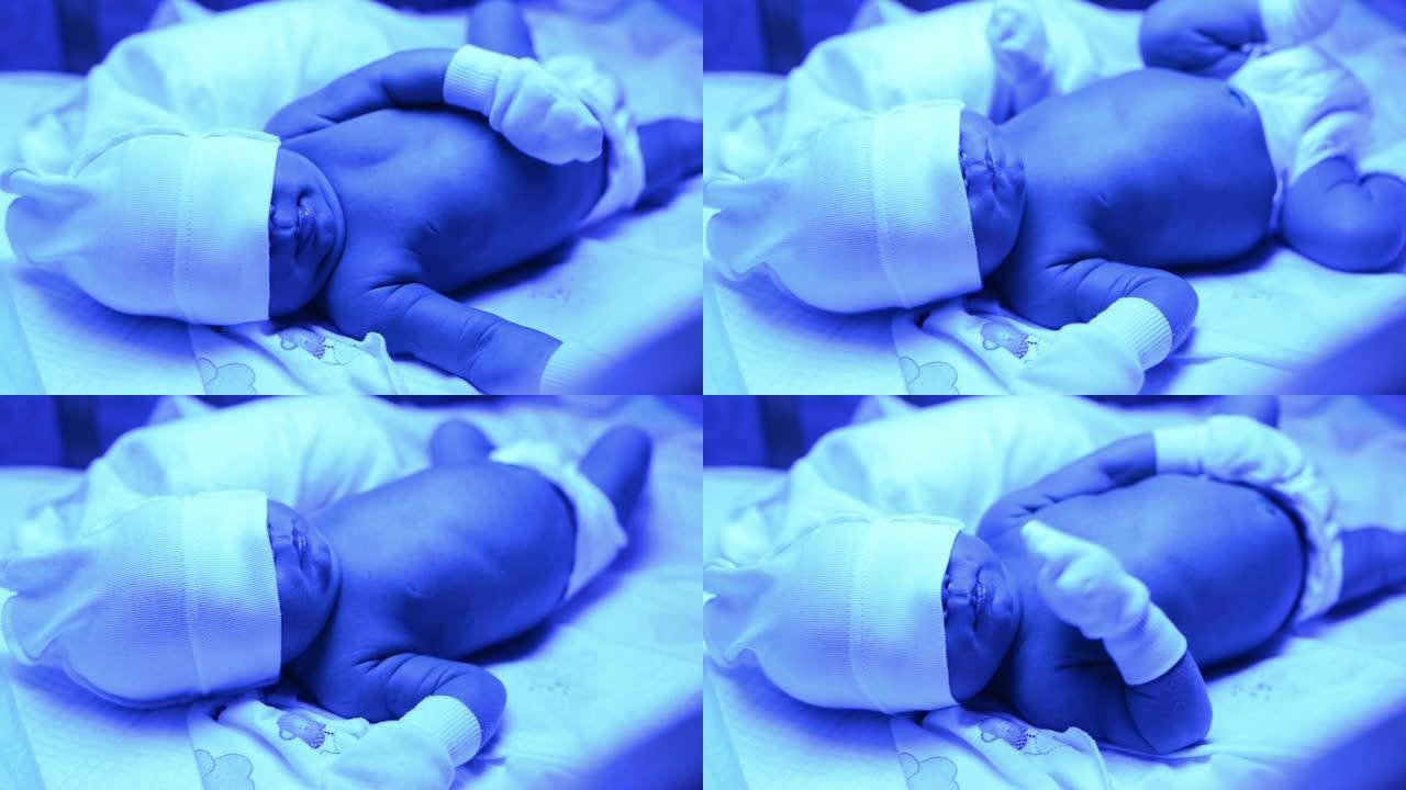 新生儿在家庭床上在紫外线灯下治疗黄疸