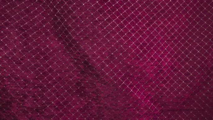 织物在风中吹冬季挡风被红色紫红色布料窗帘