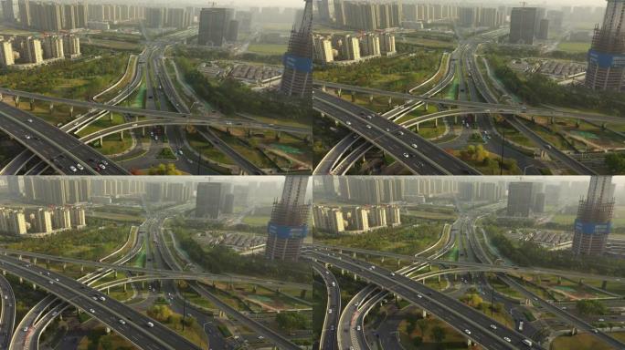 飞行超过日落时间光杭州交通街道道路交汇处城市景观建设航拍全景4k中国