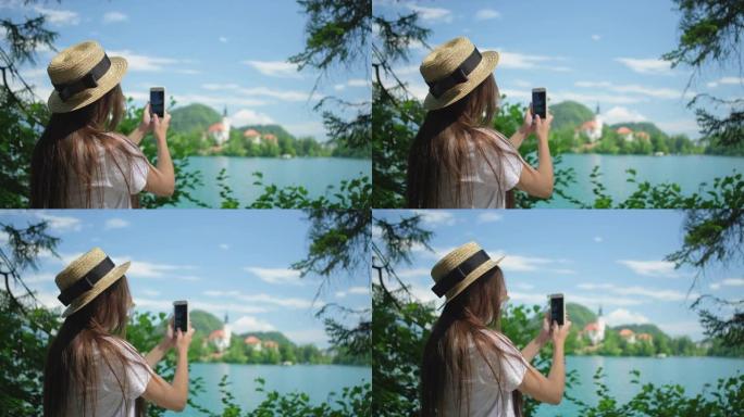 女孩想分享斯洛文尼亚布莱德湖的风景并拍照