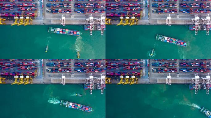 4K，航拍集装箱船，以码头起重机进出口，全球商业货物货运运输商业贸易物流和全球集装箱船。