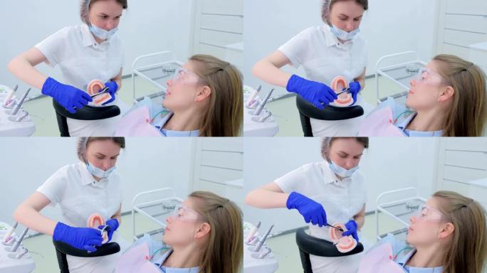 牙医教患者下颌模型如何正确清洁牙齿牙刷。