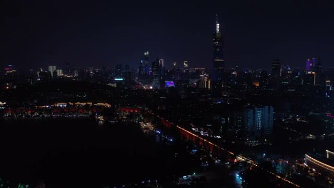 南京城市夜景照明湖畔公园市中心塔楼空中全景4k中国