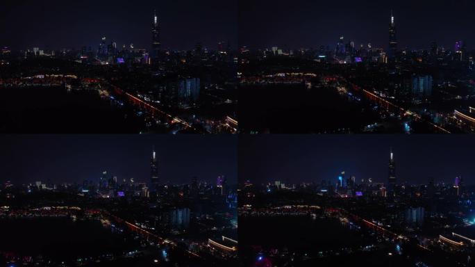 南京城市夜景照明湖畔公园市中心塔楼空中全景4k中国