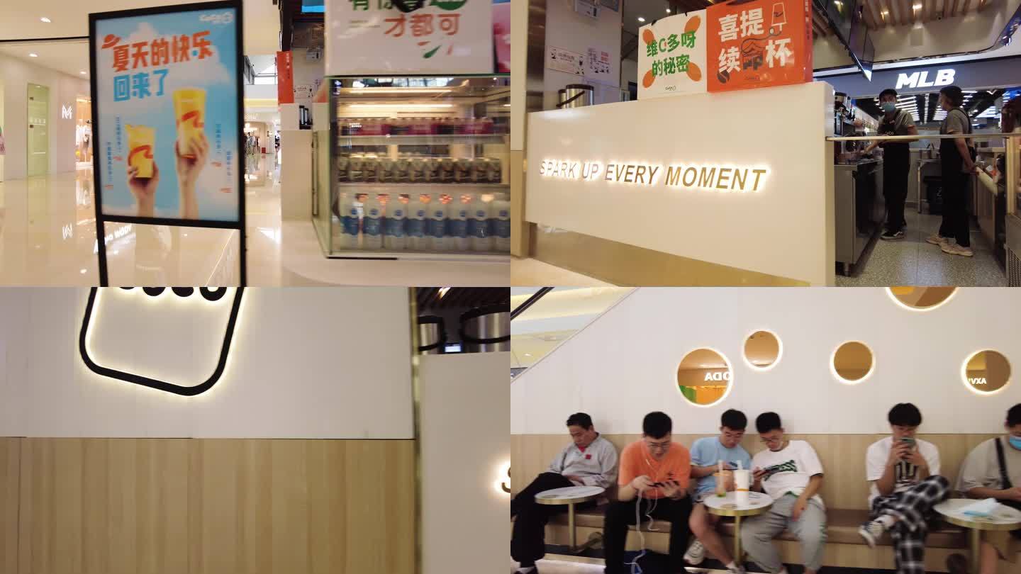 奶茶店铺顾客座位享用食品