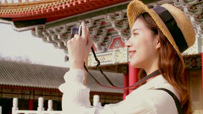 亚洲女性旅行者在亚洲拍摄寺庙