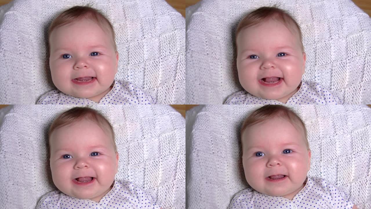 可爱的可爱宝宝对着镜头开心地微笑