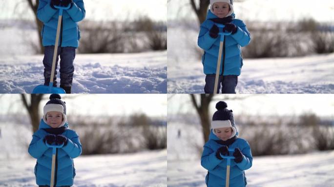 冬天铲雪的小男孩。