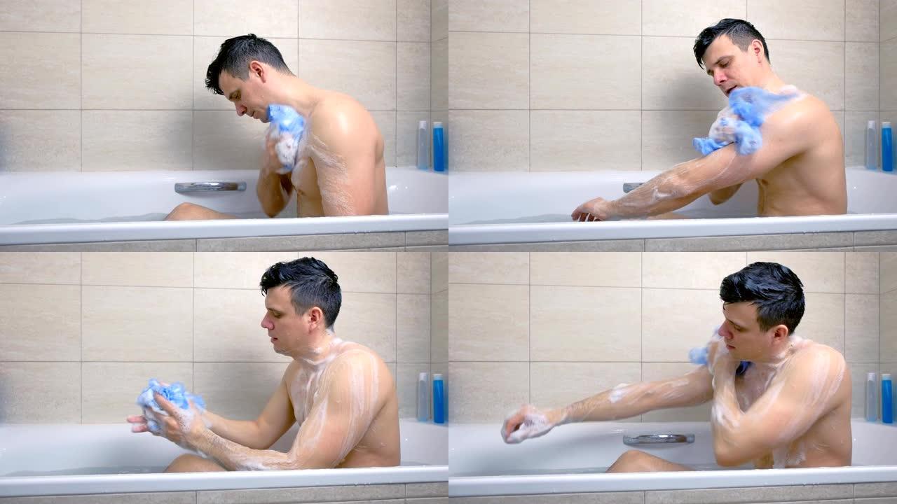 男人坐在浴缸里用沐浴露洗身体。