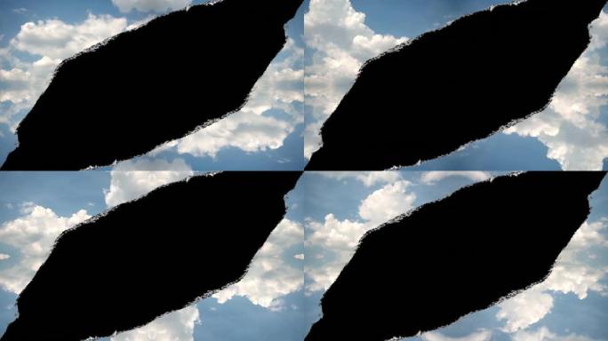 创意4k时间圈视频，在天空中有一个洞，移动的云层，边缘撕裂，就像在纸上，黑色中心被隔离。空间洞的概念