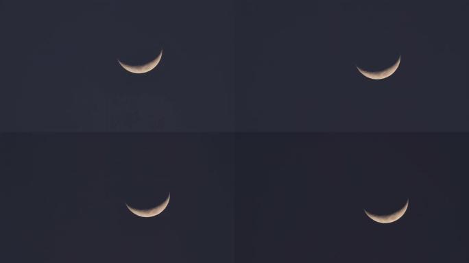 背景新月，月亮在暮色中从天而降。加速视频