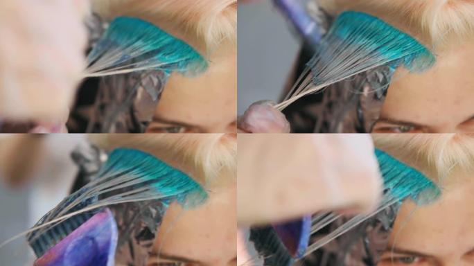 美发师调色师用刷子在头发上涂上油漆。短发，剃光太阳穴，装饰在头发上。