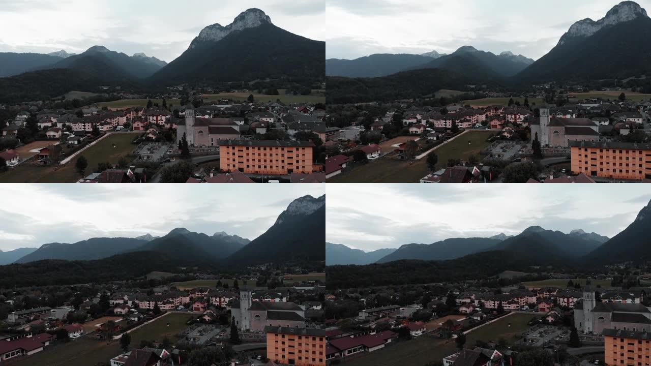 阿尔卑斯山的小山村，无人驾驶飞机拍摄风景。美丽的山景，前面是山谷。无人机沿着法国杜萨德公社飞行